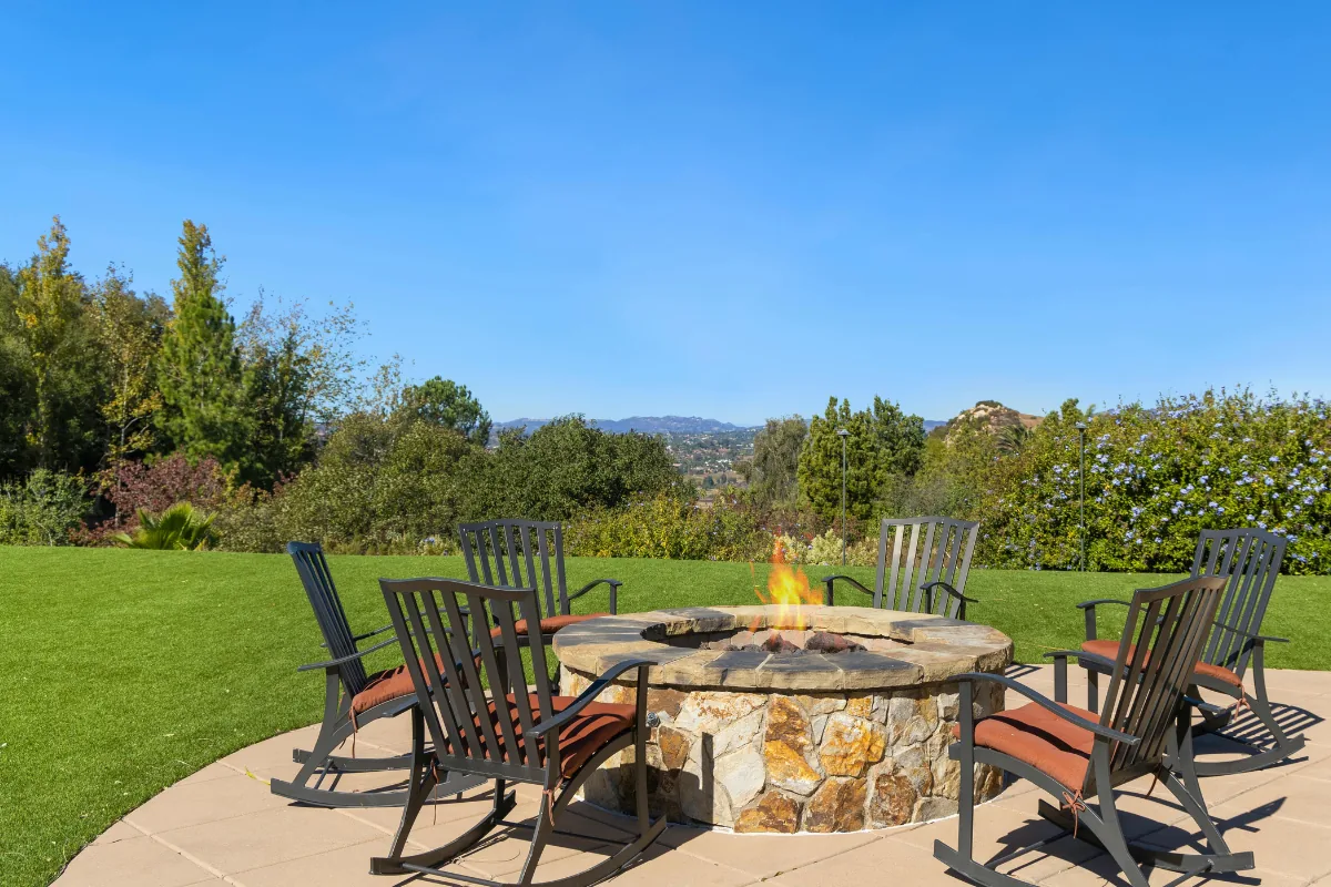 Concrete patio with stone fire pit and seating NC Foothills — The Concord Concrete Company