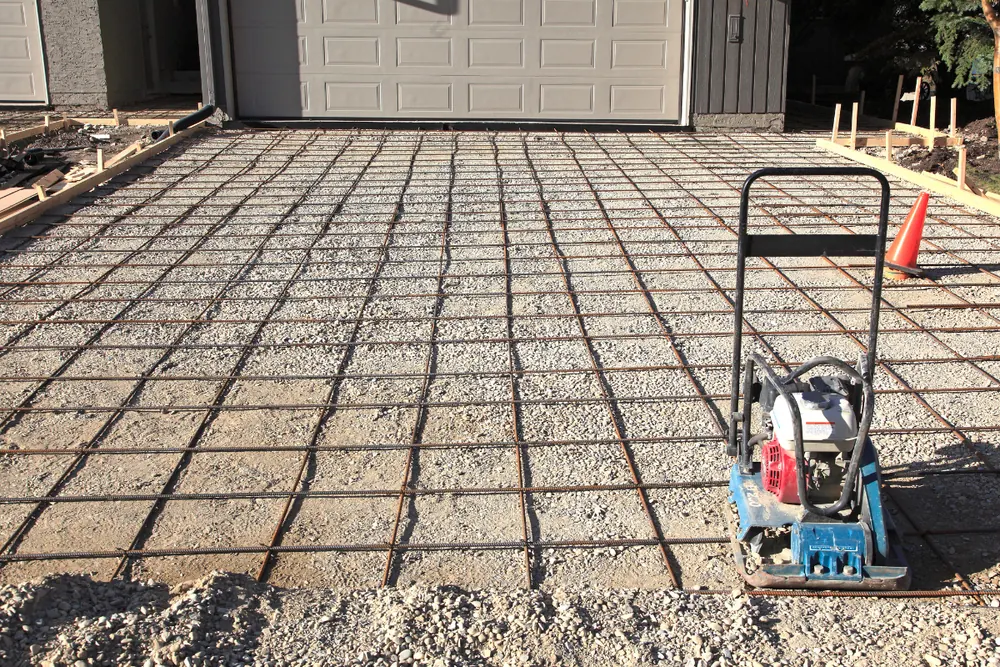 Concrete driveway rebar reinforcement and base prep Concord NC — The Concord Concrete Company